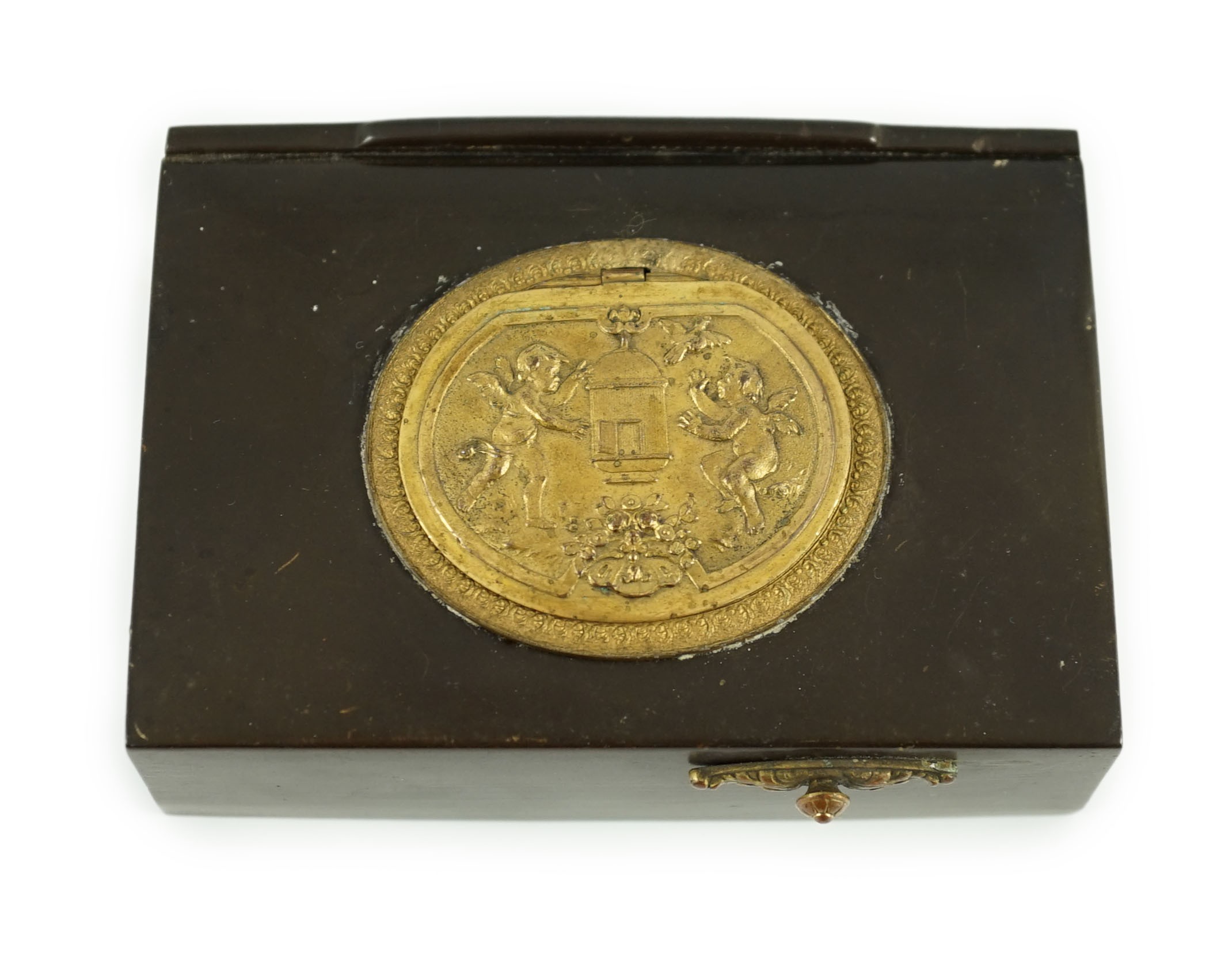 A late 19th century Swiss gilt metal mounted phenolic singing bird box, 10 x 7cm, 3cm high